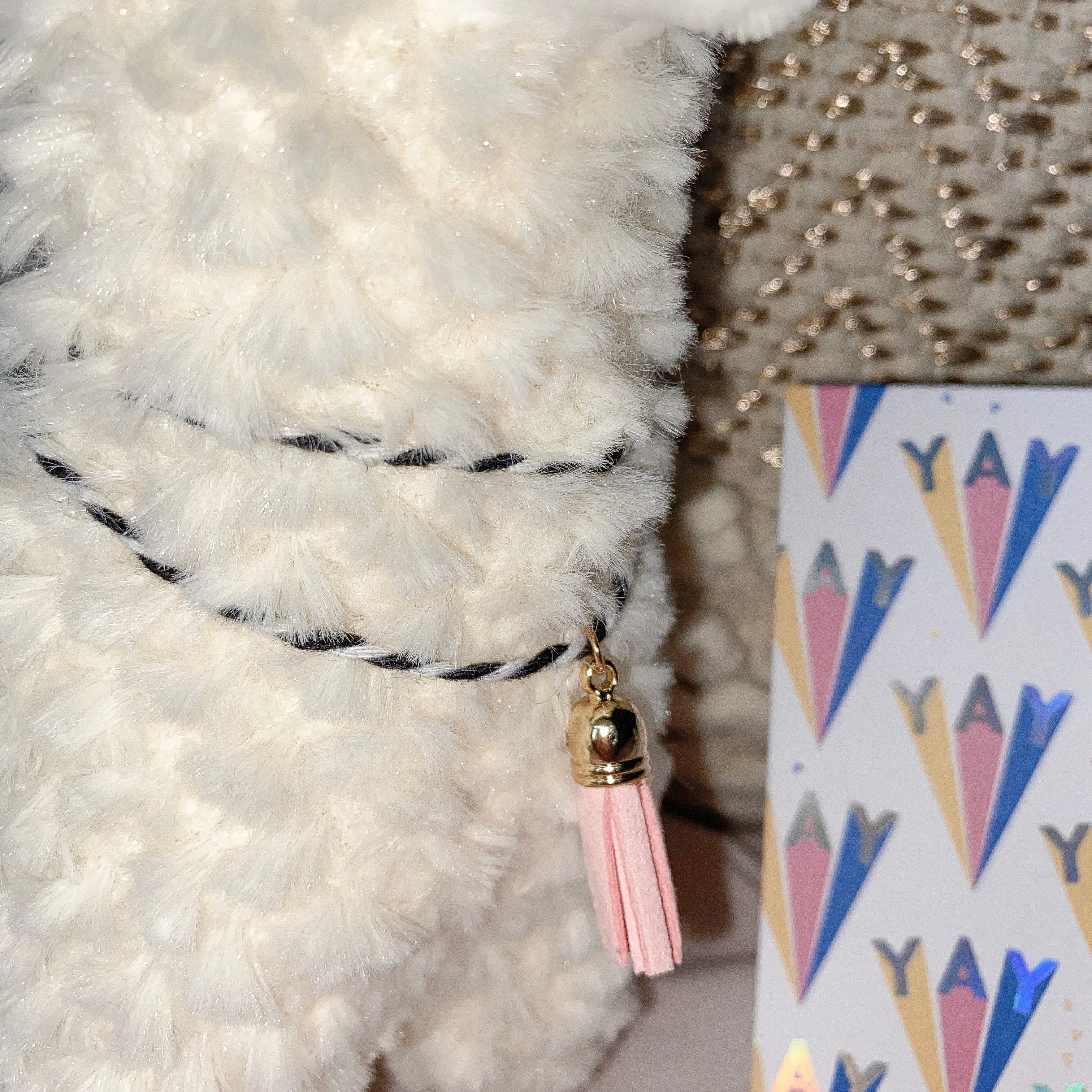 Each personalized llama comes with a tassel necklace and note card.